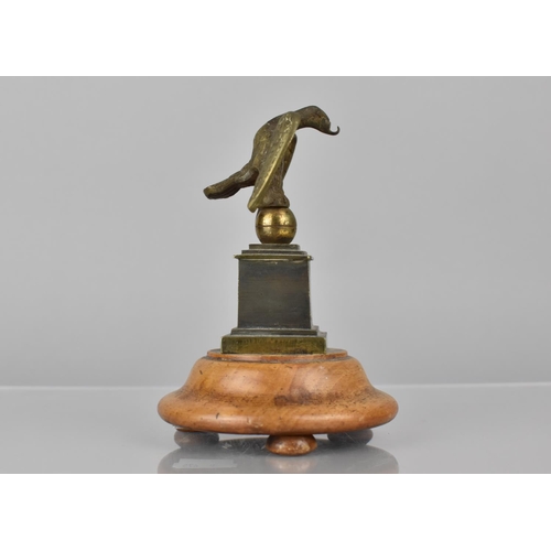 175 - A 19th Century Bronze Pocket Watch Holder in the Form of an Eagle with Wings Spread Perched on Ball ... 