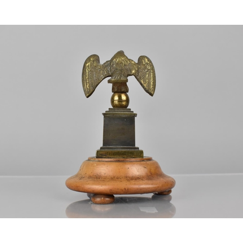 175 - A 19th Century Bronze Pocket Watch Holder in the Form of an Eagle with Wings Spread Perched on Ball ... 