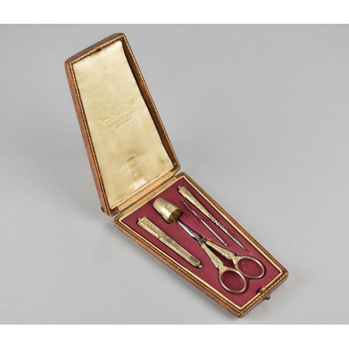 176 - A Late 19th/20th Century French Gilt Metal Sewing Etui to Comprise Needle Case, Scissors, Thimble, N... 