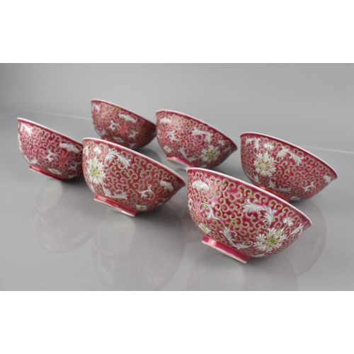 330 - A Set of Four Chinese Porcelain Bowls, Enameled Decoration incorporating Scrolls, Flowers, Bats on P... 