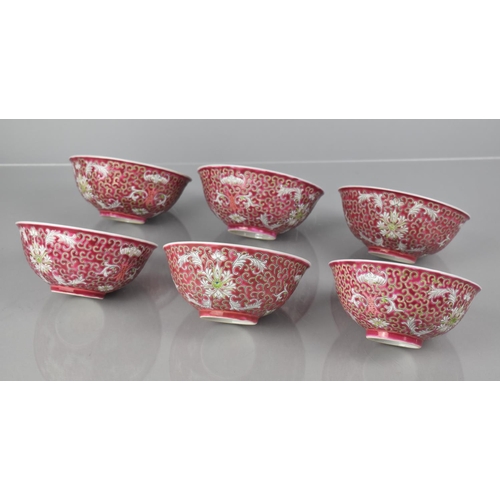 330 - A Set of Four Chinese Porcelain Bowls, Enameled Decoration incorporating Scrolls, Flowers, Bats on P... 