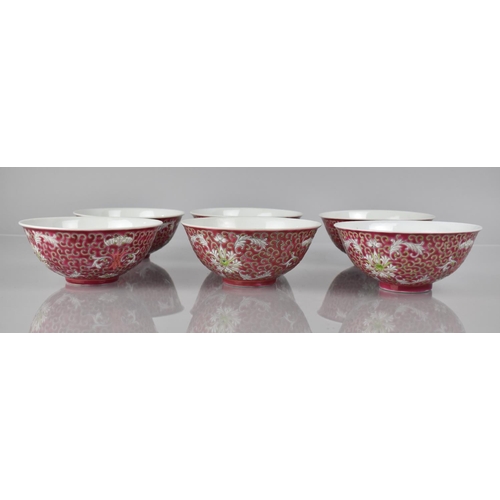 330 - A Set of Four Chinese Porcelain Bowls, Enameled Decoration incorporating Scrolls, Flowers, Bats on P... 