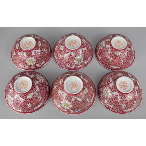 330 - A Set of Four Chinese Porcelain Bowls, Enameled Decoration incorporating Scrolls, Flowers, Bats on P... 