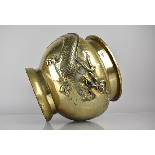 446 - A 19th Century Cast Bronze Planter incised and Relief Decoration Dragon in Scrolled Sky, 29cms High,... 