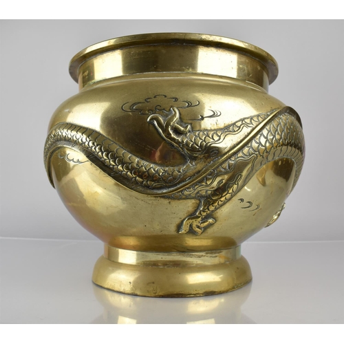 446 - A 19th Century Cast Bronze Planter incised and Relief Decoration Dragon in Scrolled Sky, 29cms High,... 