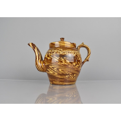 265 - A Late 19th century Slipware Double Spout Marriage Teapot and Cover, Inscribed Mr and Mrs Schofield ... 