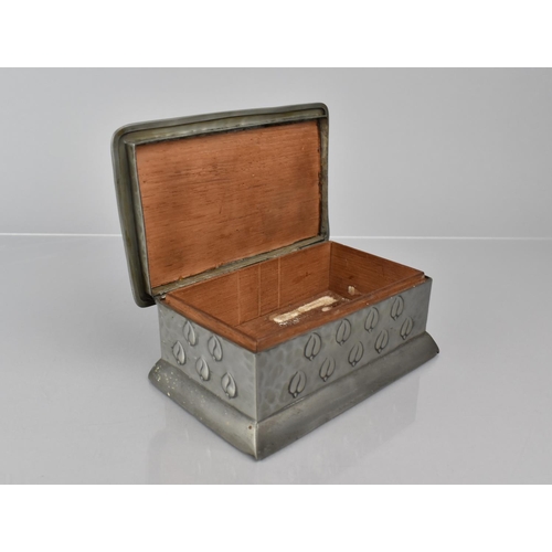 162 - An Arts and Crafts Castle Pewter Box in the Liberty Tudric Style with Embossed Leaf Design and Hamme... 