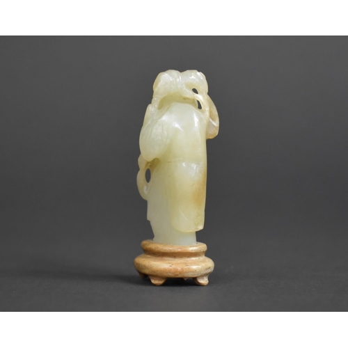 324 - A Chinese Carved Jade Study of an Immortal on Fitted Wooden Plinth, 7cms High. Condition:Not Perfect... 