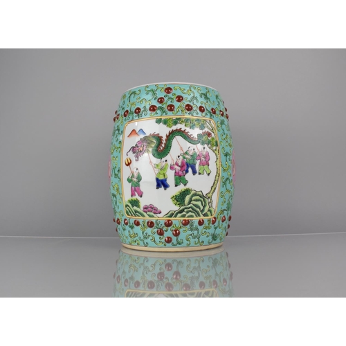 95 - A 20th Century Chinese Porcelain Miniature Stool of Barrel Form decorated in the Famille Rose Palett... 