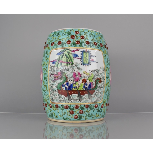 95 - A 20th Century Chinese Porcelain Miniature Stool of Barrel Form decorated in the Famille Rose Palett... 