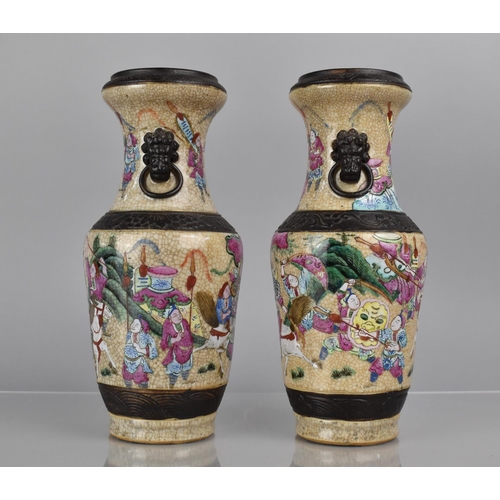 356 - A Pair of Chinese Nanking Crackle Glazed Vases decorated in the Famille Rose Palette with Battle Sce... 