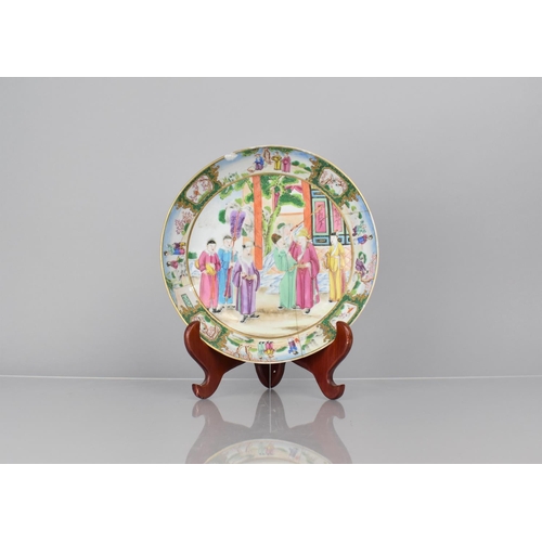 360 - An 18th Century Chinese Plate decorated in the Famille ROse Palette with Figural Court Scene in Exte... 