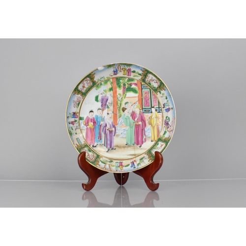 360 - An 18th Century Chinese Plate decorated in the Famille ROse Palette with Figural Court Scene in Exte... 