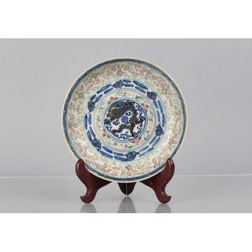 382 - A Chinese Porcelain Dish decorated with Underglaze Blue Design with Central Dragon and Flaming Pearl... 