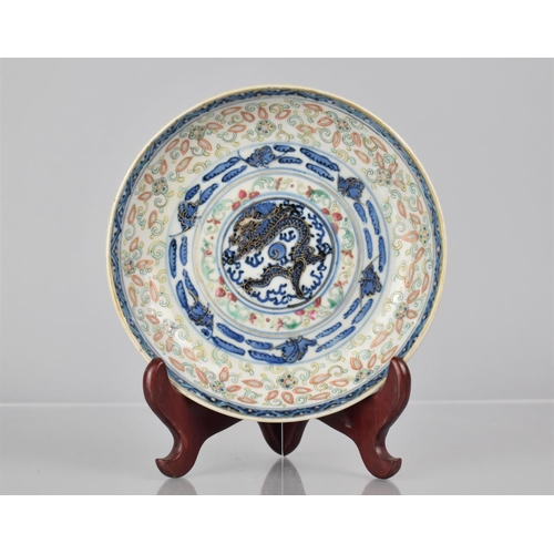 382 - A Chinese Porcelain Dish decorated with Underglaze Blue Design with Central Dragon and Flaming Pearl... 