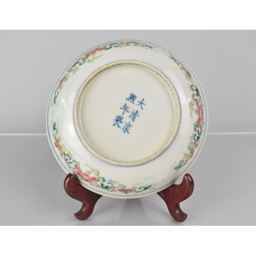 382 - A Chinese Porcelain Dish decorated with Underglaze Blue Design with Central Dragon and Flaming Pearl... 