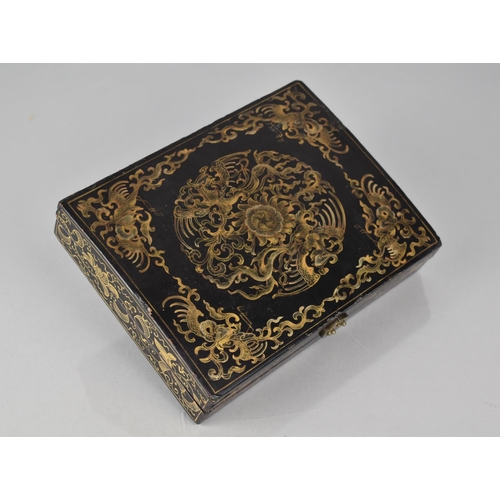 453 - A 19th Century Chinese Lacquered Box Decorated in Gilt With Phoenix Motif and Scrolls, Hinged Lid Ho... 