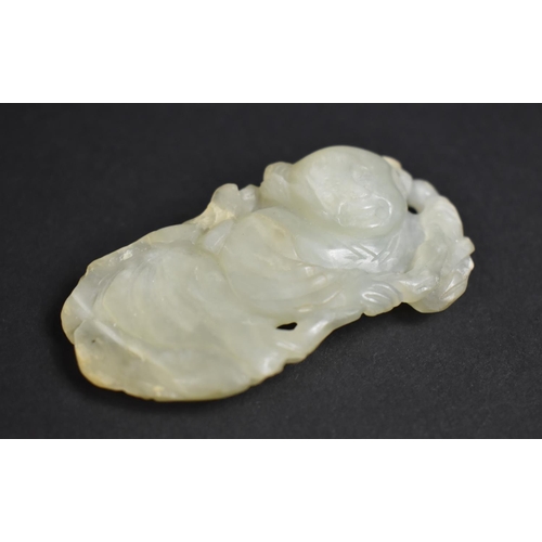 456 - A Chinese Carved Jade Item, Immortal, 7cms Wide. Condition: Not Perfect with Chips and Nicks