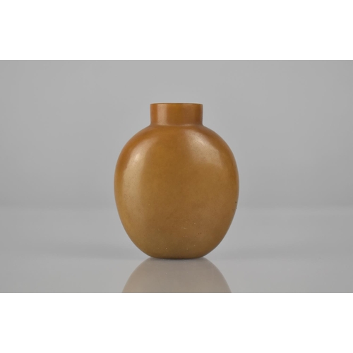 460 - A 19th Century Chinese Toffee Coloured Hardstone Snuff Bottle, 6cms High