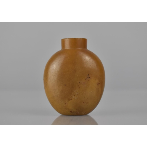 460 - A 19th Century Chinese Toffee Coloured Hardstone Snuff Bottle, 6cms High