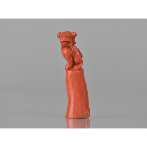 461 - A 19th Century Chinese Carved Coral Seal with Temple Lion Finial, 5.5cms High. Condition: Not in per... 