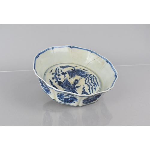 377 - A Chinese Ming Style Blue and White Bowl having Fluted Flaring Sides Decorated with Phoenix in Scrol...