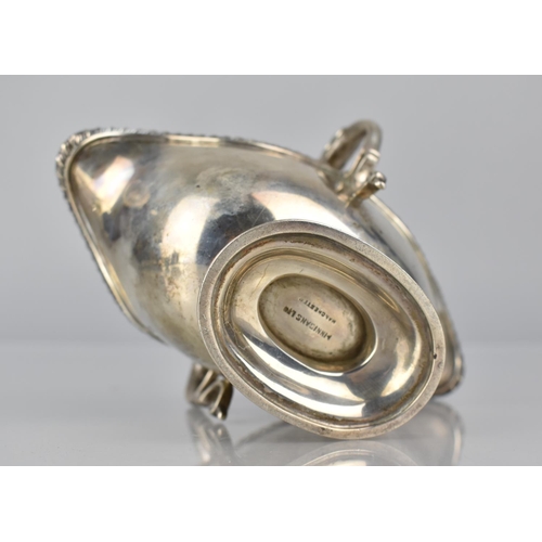 221 - A Victorian Silver Two Handled and Lipped Sauce Boat by Finnigans Ltd, London, Hallmark 1860, 180gms