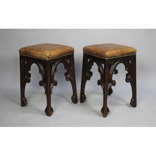 156 - A Pair of Gothic Revival Oak Stools with Hide Upholstery