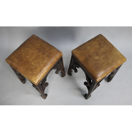 156 - A Pair of Gothic Revival Oak Stools with Hide Upholstery