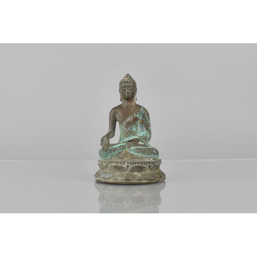 439 - A Patinated Bronze Buddha, 9.5cms High