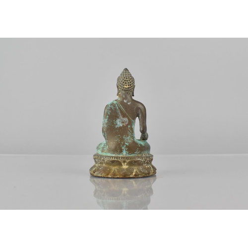 439 - A Patinated Bronze Buddha, 9.5cms High