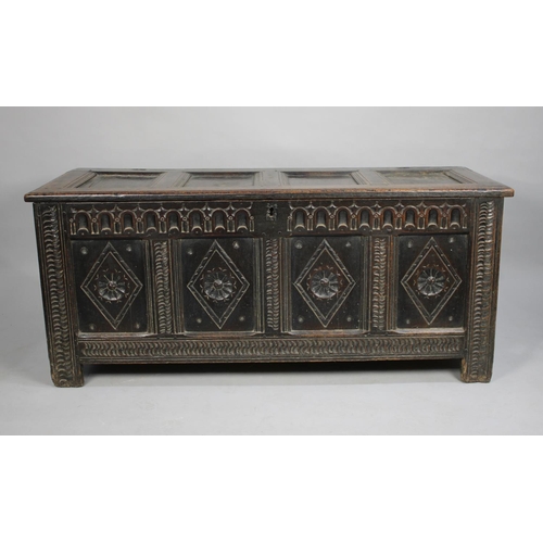 485 - An Early Oak Four Panel Lift Top Coffer Chest with Carved Lozenge Decoration