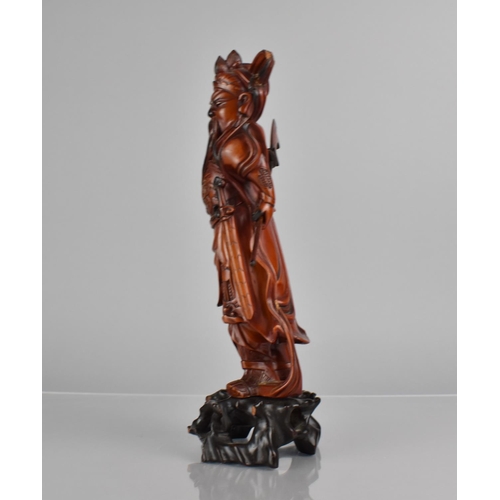 422 - A Nicely Carved Chinese Wooden and Varnished Study of Guan Yu on Pierced Naturalistic Stand, 27cms H... 