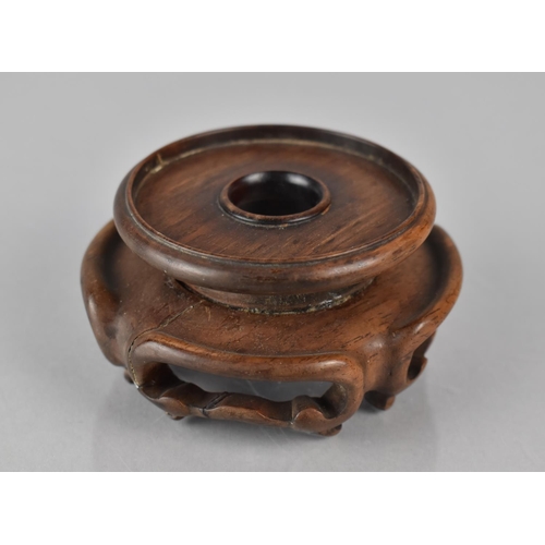 425 - A Small Chinese Hardwood Stand with Moulded and Pierced Sides to Fit 6cms Base Max Diameter 8cms and... 