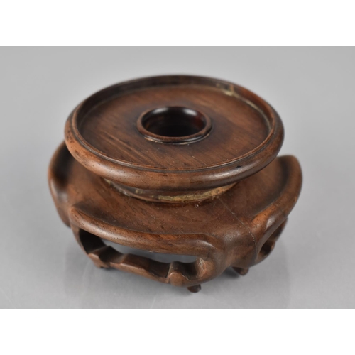 425 - A Small Chinese Hardwood Stand with Moulded and Pierced Sides to Fit 6cms Base Max Diameter 8cms and... 