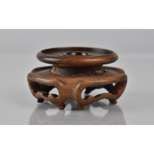 425 - A Small Chinese Hardwood Stand with Moulded and Pierced Sides to Fit 6cms Base Max Diameter 8cms and... 