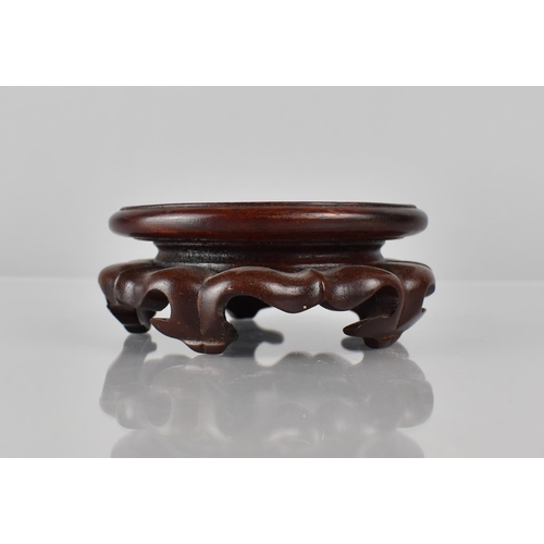 426 - A Small Chinese Hardwood Stand with Moulded Sides and raised on Scrolled Ruyi Stylised Geet to Fit 8... 