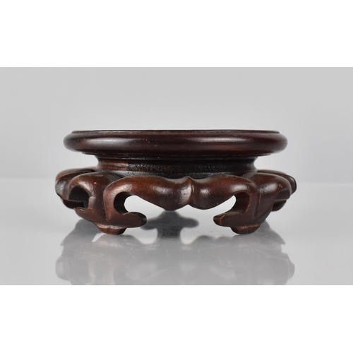 426 - A Small Chinese Hardwood Stand with Moulded Sides and raised on Scrolled Ruyi Stylised Geet to Fit 8... 