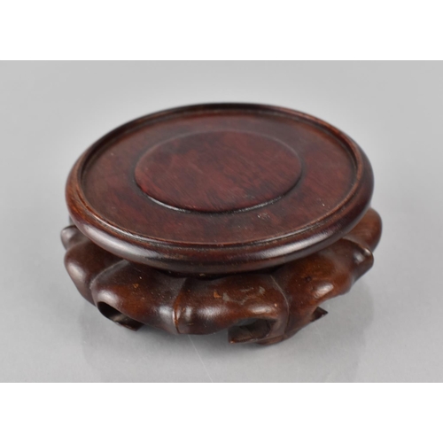 426 - A Small Chinese Hardwood Stand with Moulded Sides and raised on Scrolled Ruyi Stylised Geet to Fit 8... 