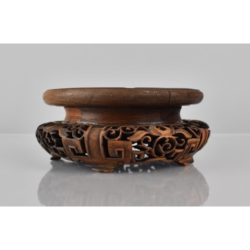 428 - A Chinese Hardwood Stand with Carved and Pierced Design to Fit 11cms Base Max Diameter, 14cms and 6c... 