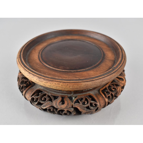 428 - A Chinese Hardwood Stand with Carved and Pierced Design to Fit 11cms Base Max Diameter, 14cms and 6c... 