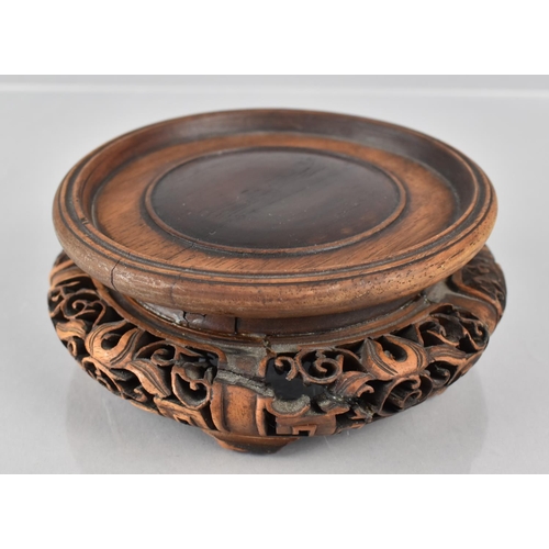 428 - A Chinese Hardwood Stand with Carved and Pierced Design to Fit 11cms Base Max Diameter, 14cms and 6c... 