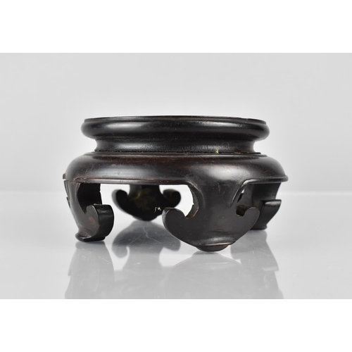 429 - A Chinese Hardwood Stand of Moulded Form with Ruyi Stylised Feet to Fit a 9.5cms Base, 13cms Diamete... 