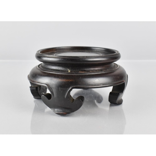 429 - A Chinese Hardwood Stand of Moulded Form with Ruyi Stylised Feet to Fit a 9.5cms Base, 13cms Diamete... 