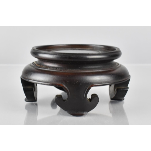 429 - A Chinese Hardwood Stand of Moulded Form with Ruyi Stylised Feet to Fit a 9.5cms Base, 13cms Diamete... 