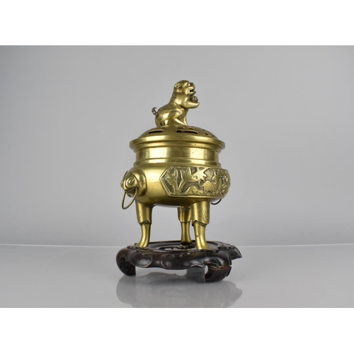 435 - A Chinese Bronze Tripod Censer and Cover. Body with Twin Ring Handles and Decorated with Cartouche P... 