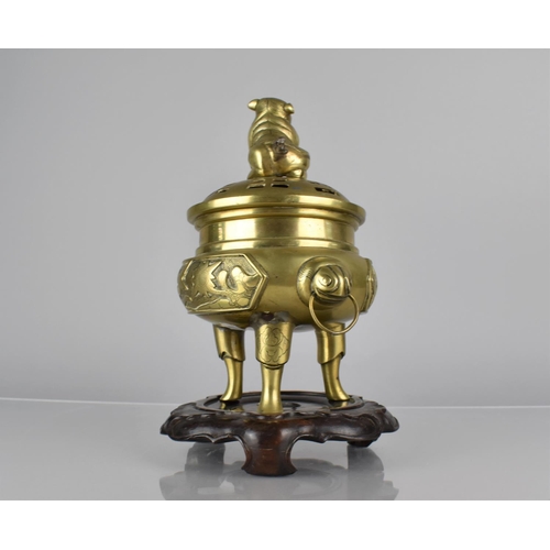 435 - A Chinese Bronze Tripod Censer and Cover. Body with Twin Ring Handles and Decorated with Cartouche P... 