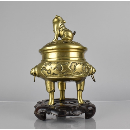 435 - A Chinese Bronze Tripod Censer and Cover. Body with Twin Ring Handles and Decorated with Cartouche P... 