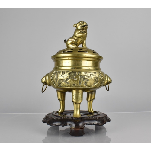 435 - A Chinese Bronze Tripod Censer and Cover. Body with Twin Ring Handles and Decorated with Cartouche P... 