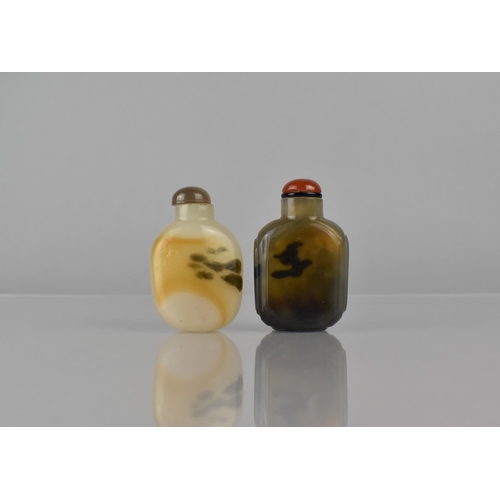 458 - A Chinese White and Russet Jade Snuff Bottle together with a Further Pale Celadon and Jade Example h... 